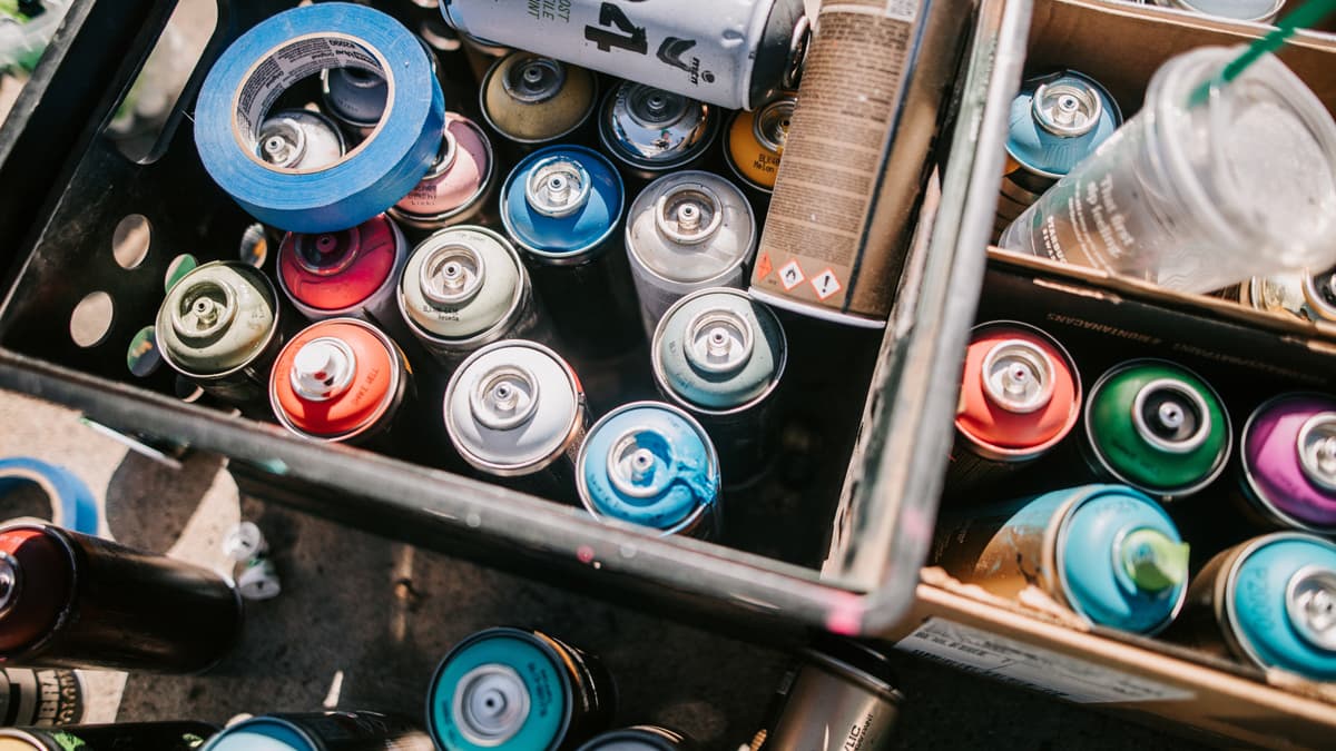 a box of spray cans